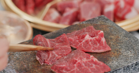 Grill beef on the hot stone