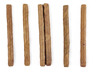 Set luxury handmade cigars isolated on white background, top view