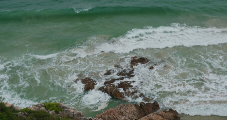 Sea wave and tropical island