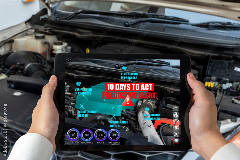 Poster engineer use augmented reality software to monitor parts of car vehicle with automated application .