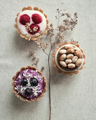 delicious tart or cakes with raspberry cherries strawberry, minimalistic natural concept