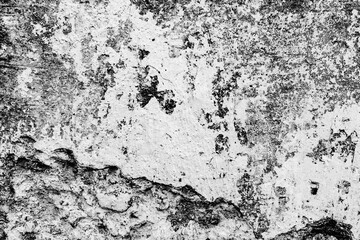 Texture of a concrete wall with cracks and scratches which can be used as a background