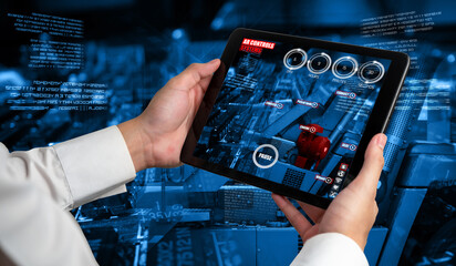 Engineer use augmented reality software in smart factory production line with automated application...