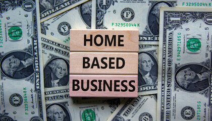 Home-based business symbol. Wooden blocks form the words 'home-based business' on beautiful...