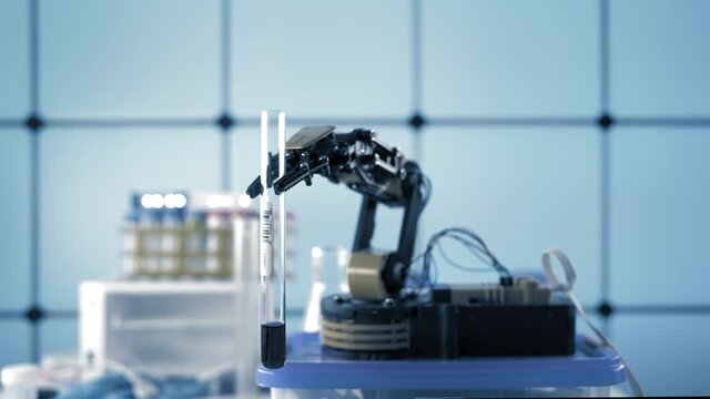 Robot arm with test tube in laboratory