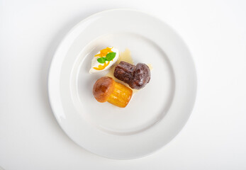 Italian dessert baba Naples, sweet cake with rum impregnation