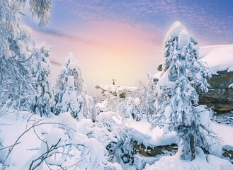 Landscape with purple color, mountains, forest and snow cover. Ural, Russia Perm Krai Stone City.
