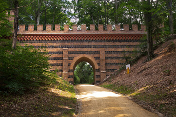 Fototapeta na wymiar Old viaduct at park Muzakowski (Park von Muskau) near Leknica. UNESCO World Heritage Site. Poland