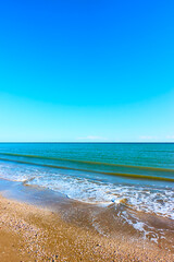 Sea, blue sky and sandy beach