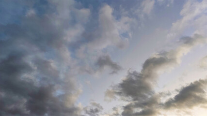 Naklejka na ściany i meble evening sky with white and gray clouds.
