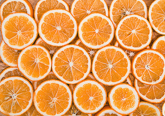 background of red oranges cut into circles