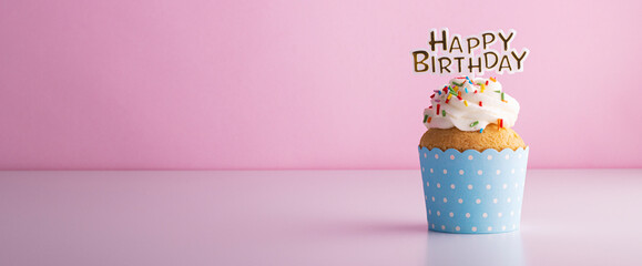 delicious beautiful cupcake cake for a birthday on a pink background