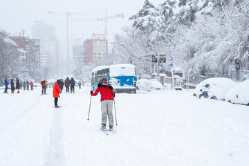 MADRID, SPAIN - January 09, 2021: People enjoying the historic Snowtorm over Madrid city, Spain.
