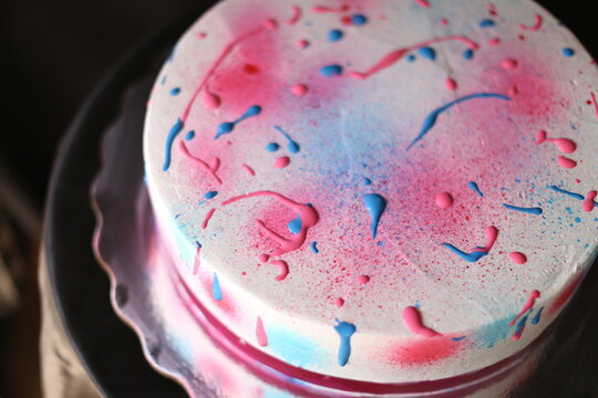 Colorful chocolate cake decorate with paint splash