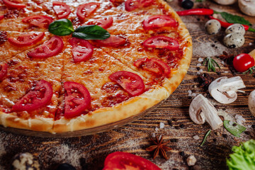fresh pizza on the boards