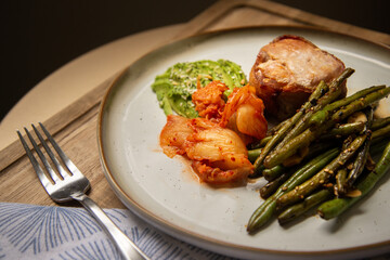 Low carb keto dinner, grilled pork with vegetables