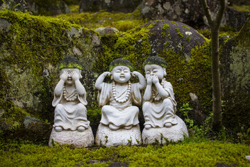 Selective focus shot of a religious sculpture in Miyajima, Japan