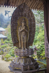 Vertical shot of a religious sculpture in Miyajima, Japan