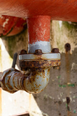 rusty gas pipe, unfocused background