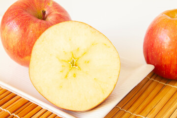 Honeycrisp apple halves close up.