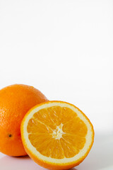 Orange halves fruit close up. White background.