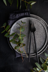 Place setting with eucalyptus © Anna Bogush