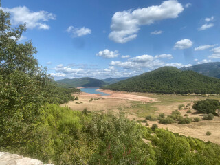 view of the Tranco reservoir located in the Sierras de Cazorla, Segura y las Villas Natural Park in Jaen, Spain