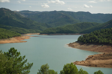 view of the Tranco reservoir located in the Sierras de Cazorla, Segura y las Villas Natural Park in Jaen, Spain