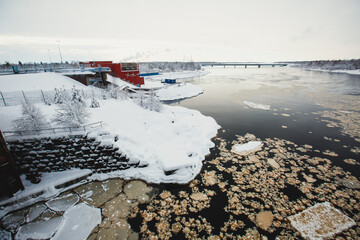 Winter view of Hydroelectric Power Plant with a dam in Lapland, Finland