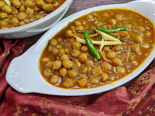 Top down view of a bowl of spicy and tangy Amritsari Chole