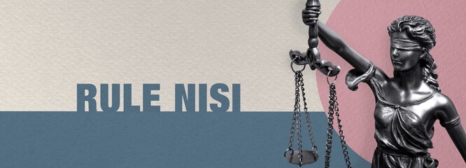 Rule Nisi. Close-up of a Lady Justice statue. Law and lawyer symbol. Figure stands in front of paper with text.