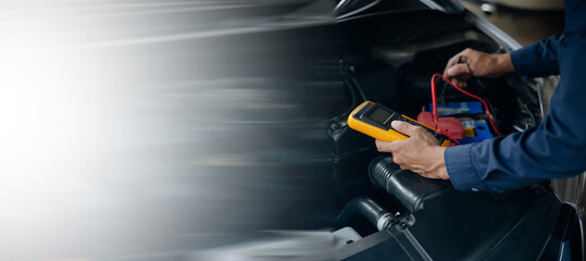 Fototapeta premium Car service, repair, maintenance concept. Auto mechanic working in garage.