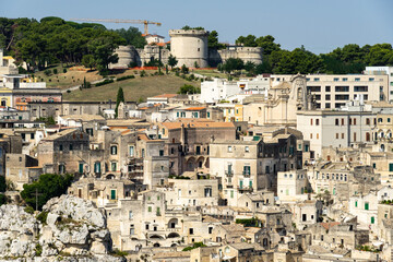Fototapeta na wymiar Sassi historic district in Matera with Tramontano castle on the top of the hill, Basilicata, Italy