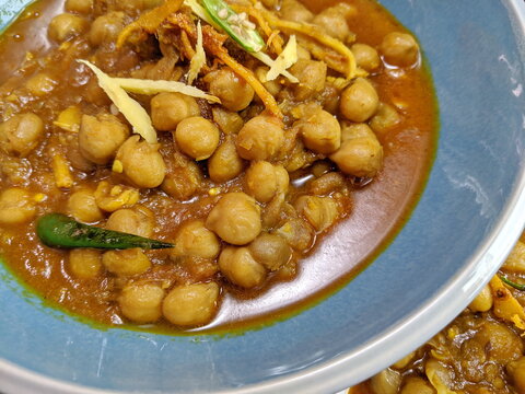 Top down view of a bowl of spicy and tangy Amritsari Chole
