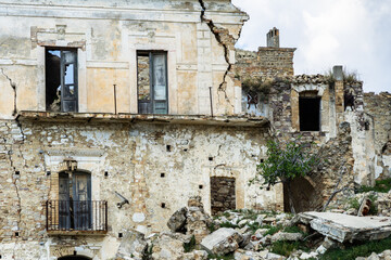 Scenic ruins of abandoned buildings in Craco, an abandoned ghost town in Basilicata region, Italy