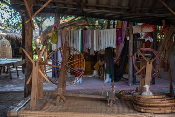 Hand weaving of cotton cloth by hill tribes of northern Thailand.