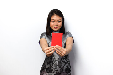 Asian Woman Dress Traditional Cheongsam, Hold Red Envelope (Angpau) and Give It To You Isolated on White Background