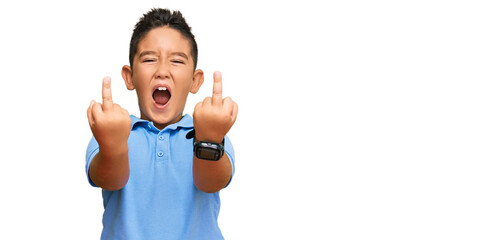 Little boy hispanic kid wearing casual clothes showing middle finger doing fuck you bad expression,...