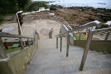 salvador, bahia, brazil - january 15, 2021: handrail is seen on a staircase leading to Ondina beach in the city of Salvador.
