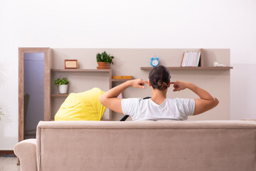 Young male contractor looking after new born at home
