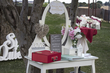Closeup of a vanity table on a wedding reception displayed outdoors