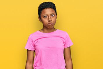 Young african american woman wearing casual clothes depressed and worry for distress, crying angry and afraid. sad expression.
