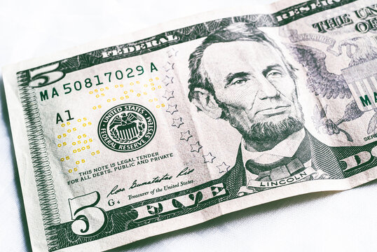 Dollar ( USD ). Money Of United States Of America. Five Dollar Bill In Close-up With White Background. Us Currency, Usa, Isolated, Economy, American, Abraham Lincoln, Close-up.