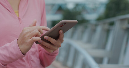 Woman use of mobile phone at outdoor
