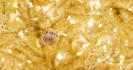 Christmas tree decoration in gold color