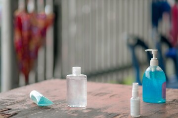 
Hand sanitizer and alcohol on the table