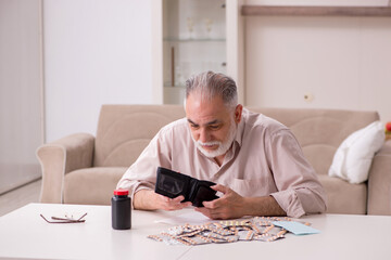 Old sick man suffering at home