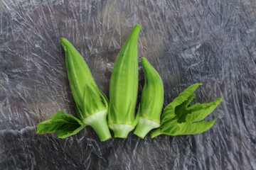 close up bunch of green okras after harvesting 