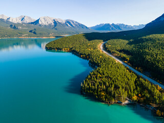 Aerial view on a turquoise lake and road
