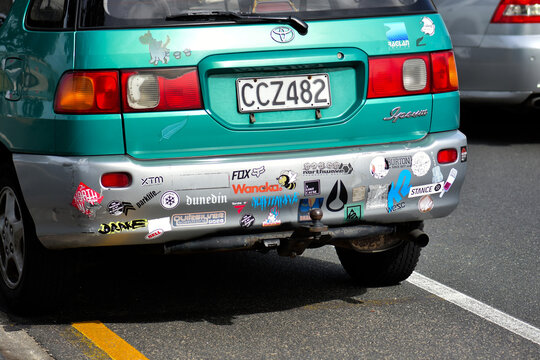 AUCKLAND, NEW ZEALAND - Dec 25, 2020: local surfer's car with bumper stickers